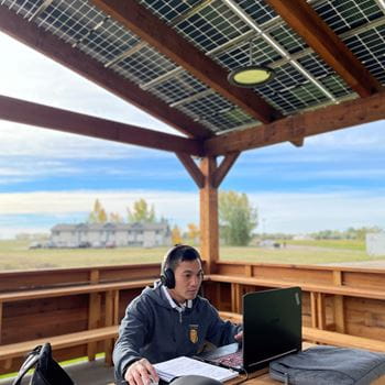 Student working in Brooks Campus Solar Classroom