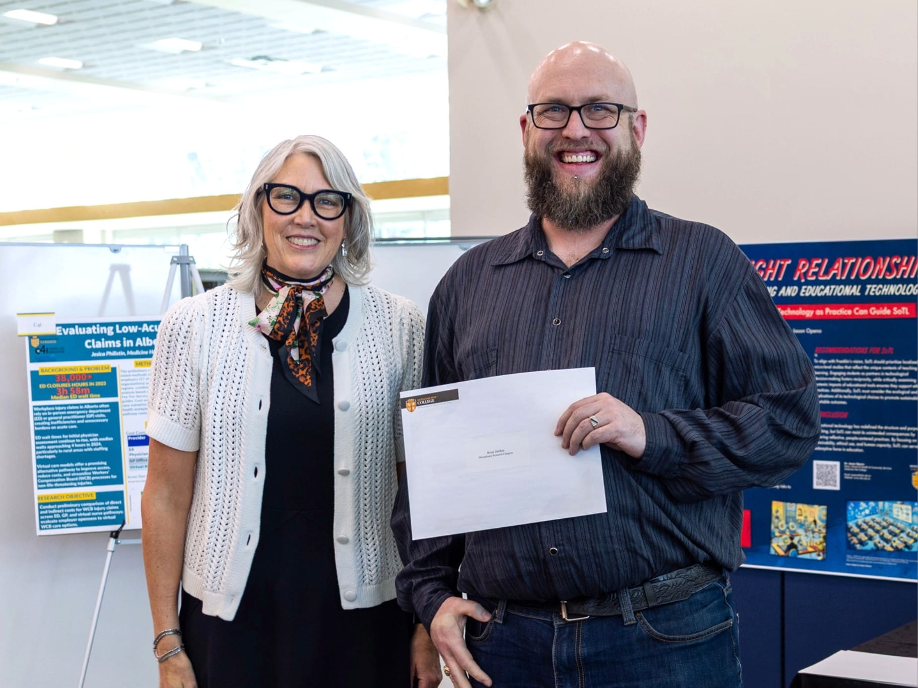 Disciplinary Research Award: Brian Duffels with Nancy Brown presenting the project, Investigating the Psychological and Behavioral Consequences of Emotion Induction: An Evolutionary Approach.