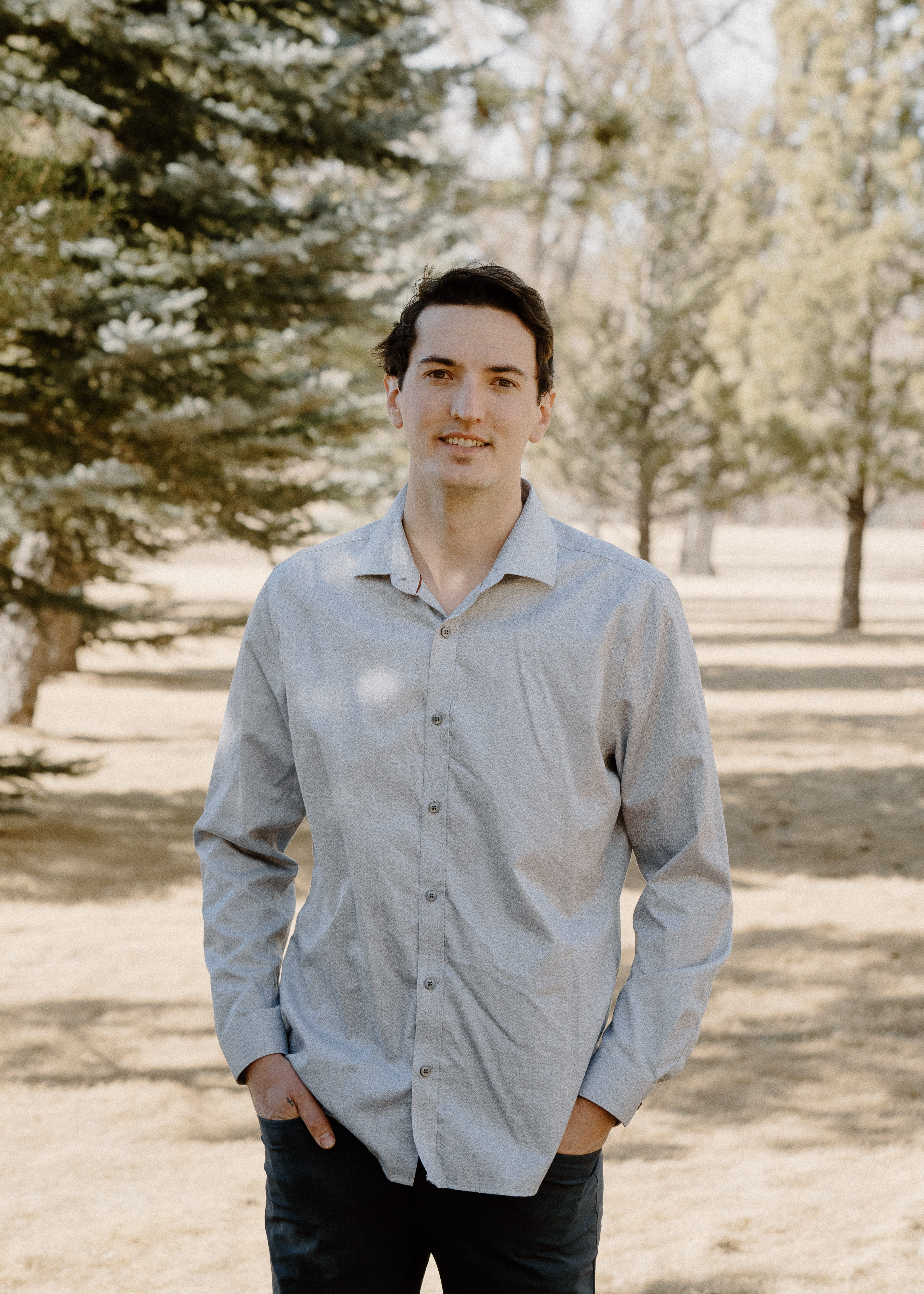 Zenon Parchewsky standing outside with trees in the background