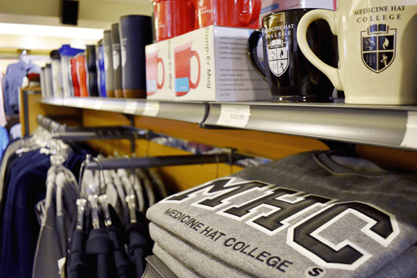 Close up of college sweater and coffee mugs in The Bookstore