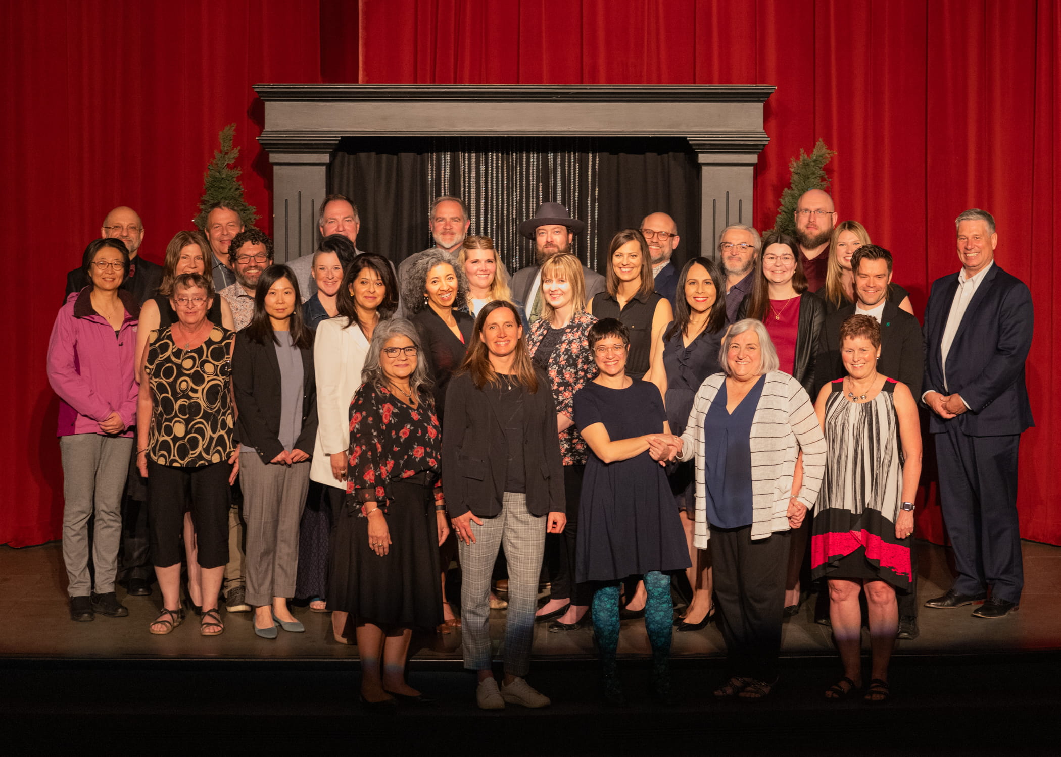MHC employees celebrate long service awards at 2024 recognition event.