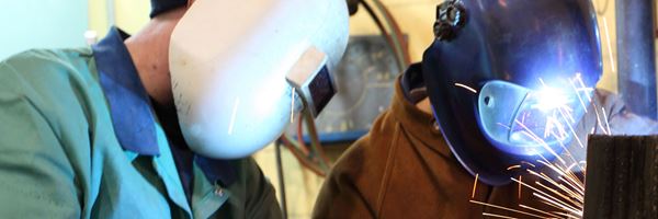 MHC students demonstrate welding technique. 