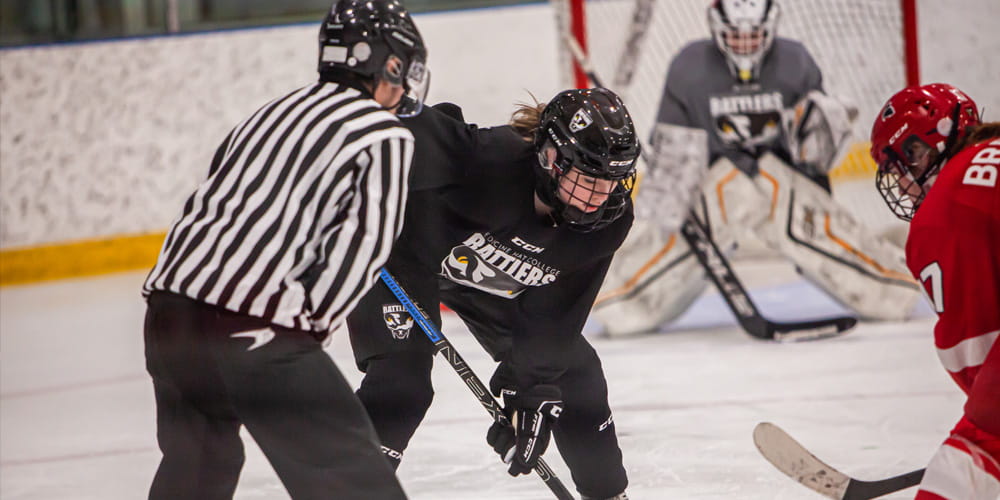 Rattlers hockey player prepares for face off. 