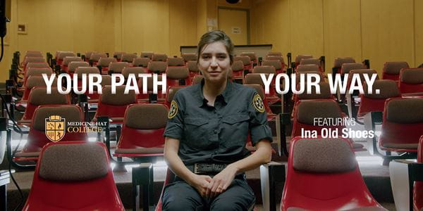 Ina Old Shoes sitting in lecture classroom - Pathways.