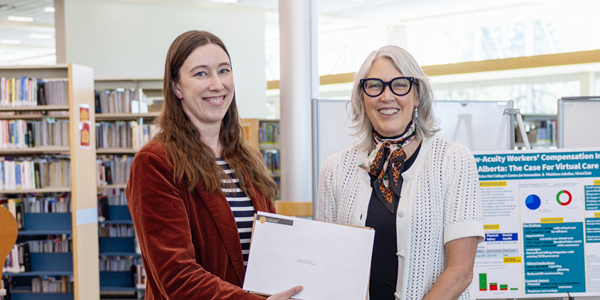 The Scholarship Award: Jana Smith Elford presenting the project, From a Feminist Ethic of Care to a Total Learning Experience: Co-creating Knowledge with Student Researchers on the AdArchive Project